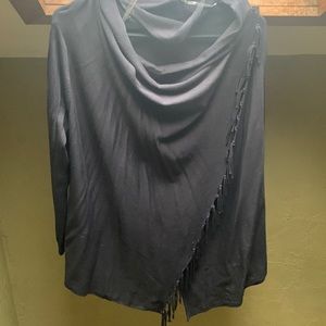 Blueish/grey fringed long sleeve knit poncho style top.